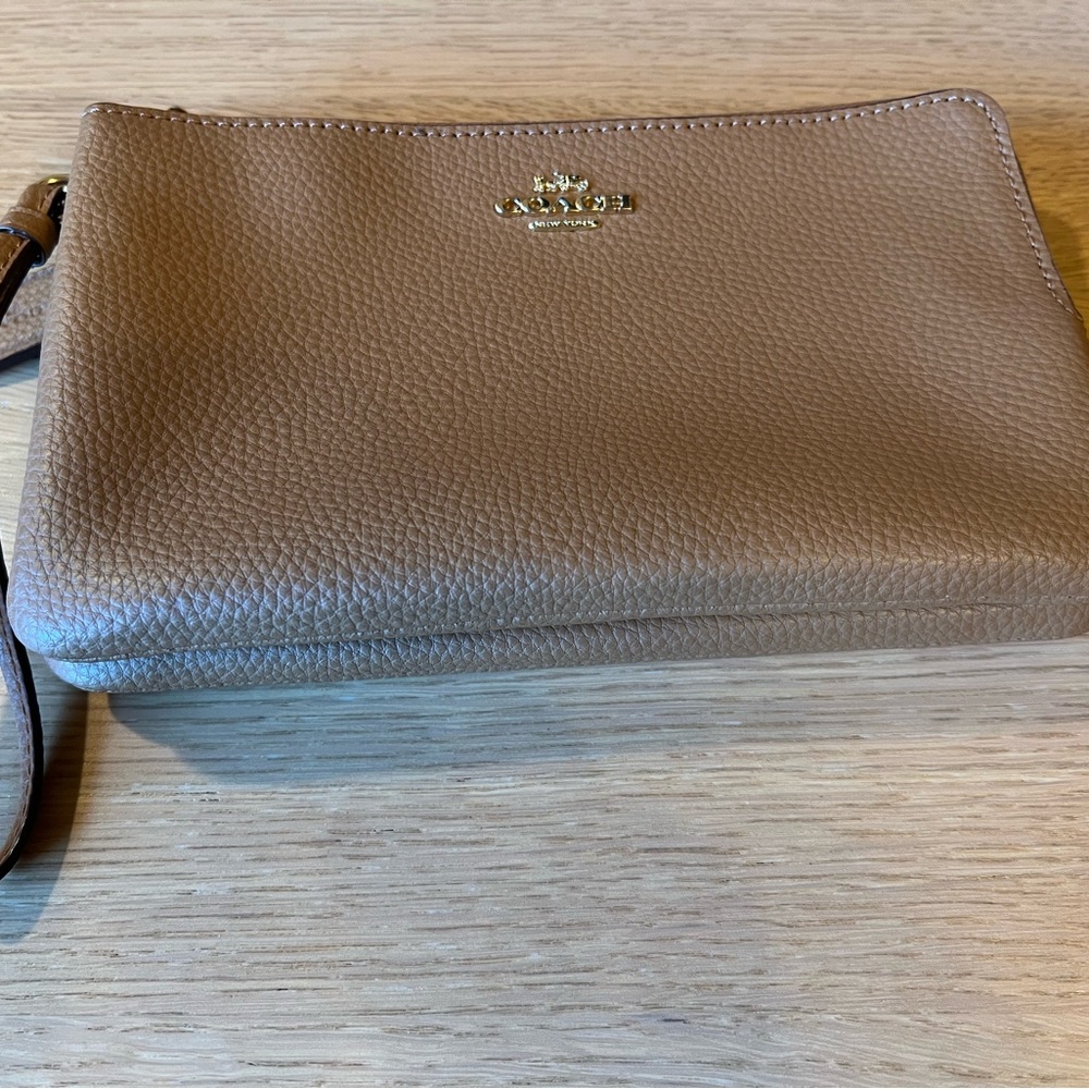 Coach Tan Leather Wristlet with two pockets